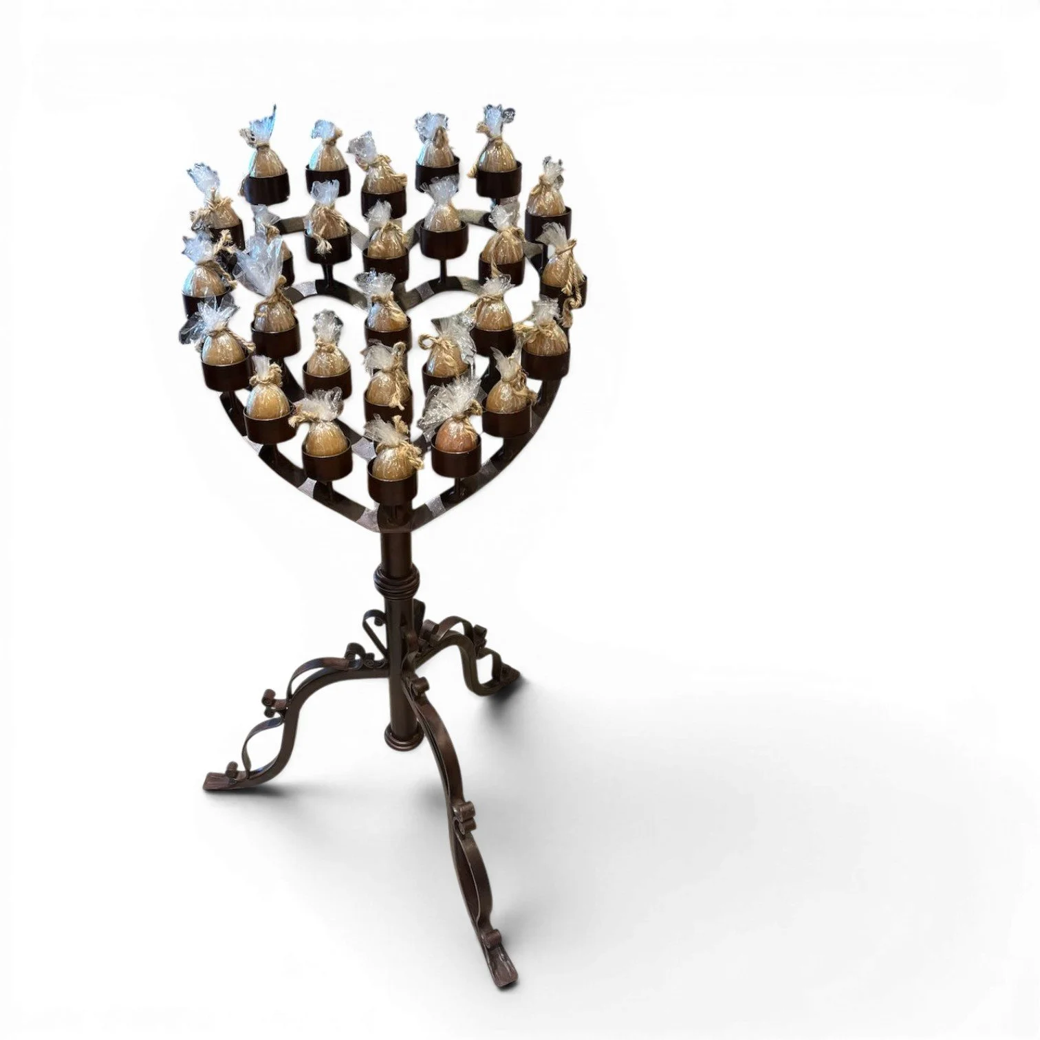 Handmade Mexican wrought iron heart candelabra centerpiece with bronze finish and elegant scrollwork