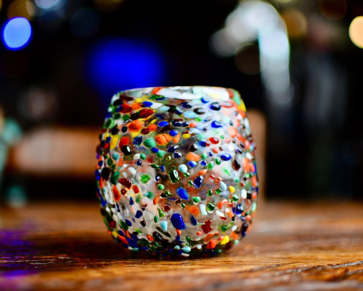 Handblown Mexican Guanajuato confetti glass with rounded base and colorful artisan finish.