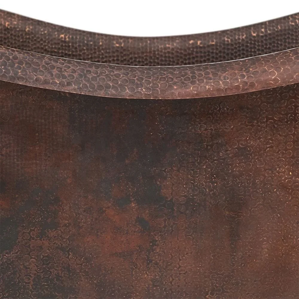 Handmade Hacienda 67-inch hammered copper double slipper bathtub with oil rubbed bronze finish crafted in Mexico.