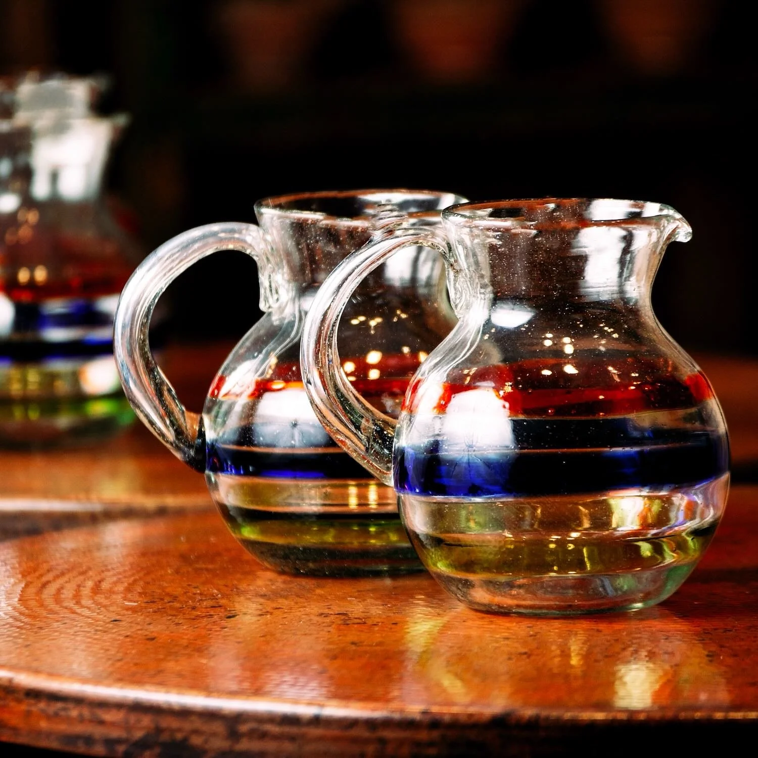 Handblown tricolor pitcher from Mexico.