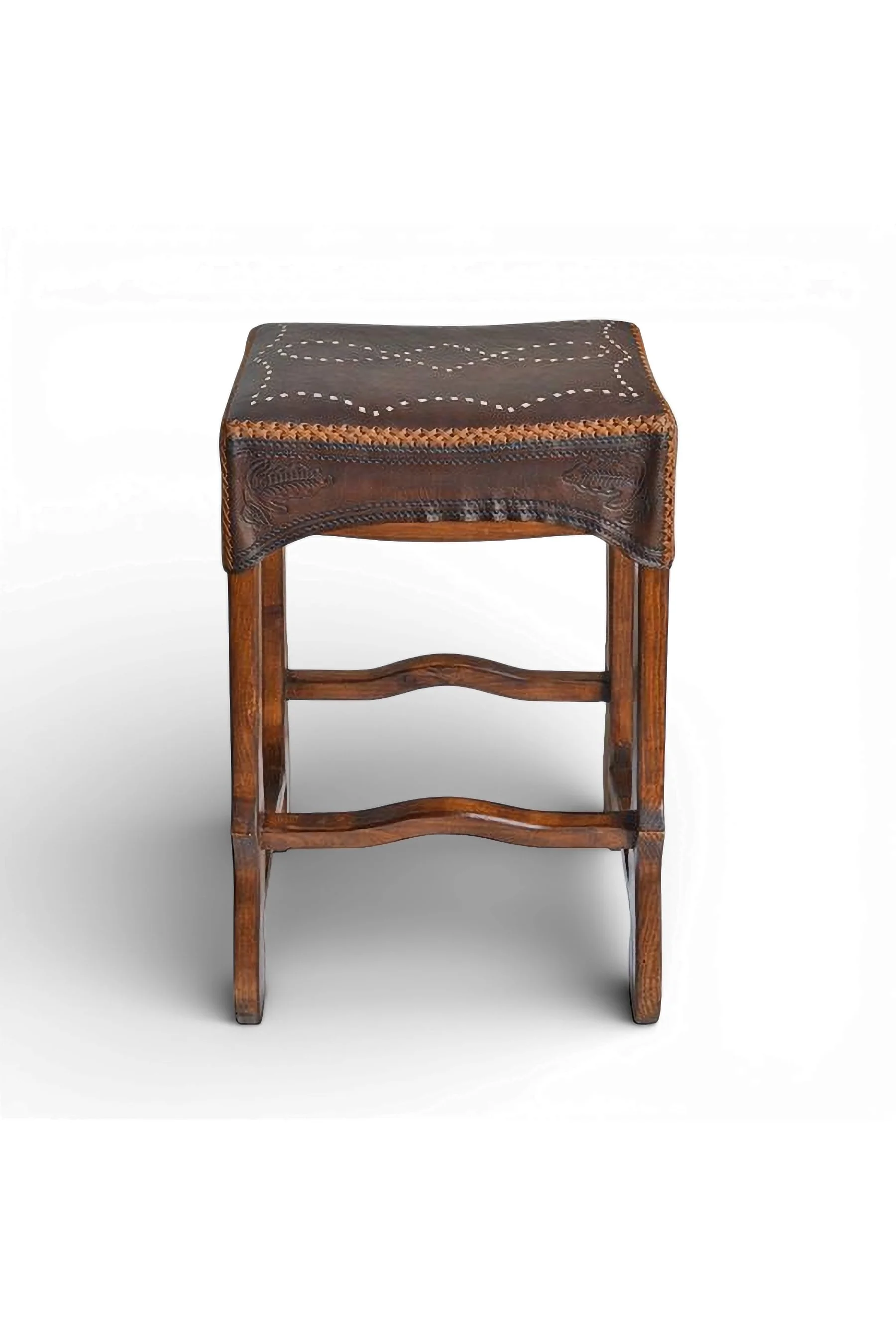 Shop a handmade leather saddle stool from Mexico. Rustic wood and stitched leather design for comfortable bar and counter seating.
