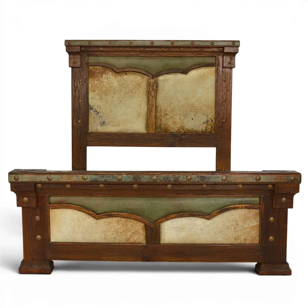 White Sands Copper and Cowhide Bed handcrafted in Mexico with leather panels, hand-pounded copper trim, clavos, and carved wood details.