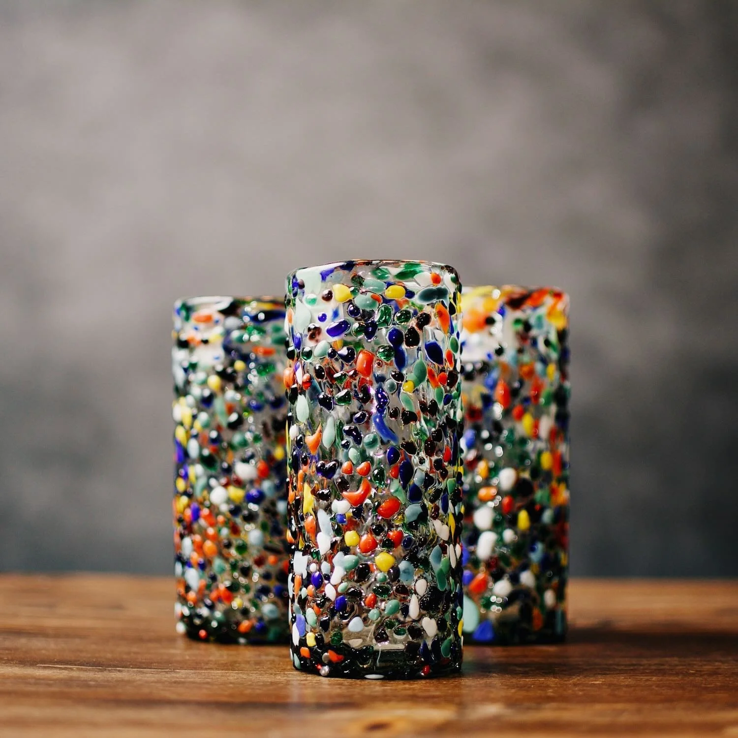 Handblown Mexican Guanajuato confetti Collins glass with colorful textured artisan finish.