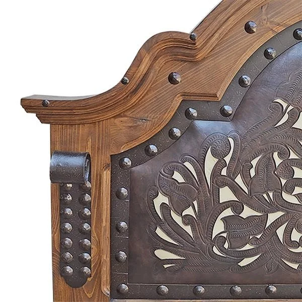 Shop a handmade tooled leather bed from Mexico. Rustic hacienda-style bed with carved wood, iron accents, and artisan craftsmanship.