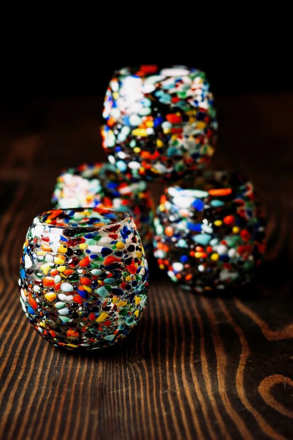 Shop a handblown Guanajuato glass from Mexico. Colorful confetti design artisan drinkware perfect for everyday use or entertaining.