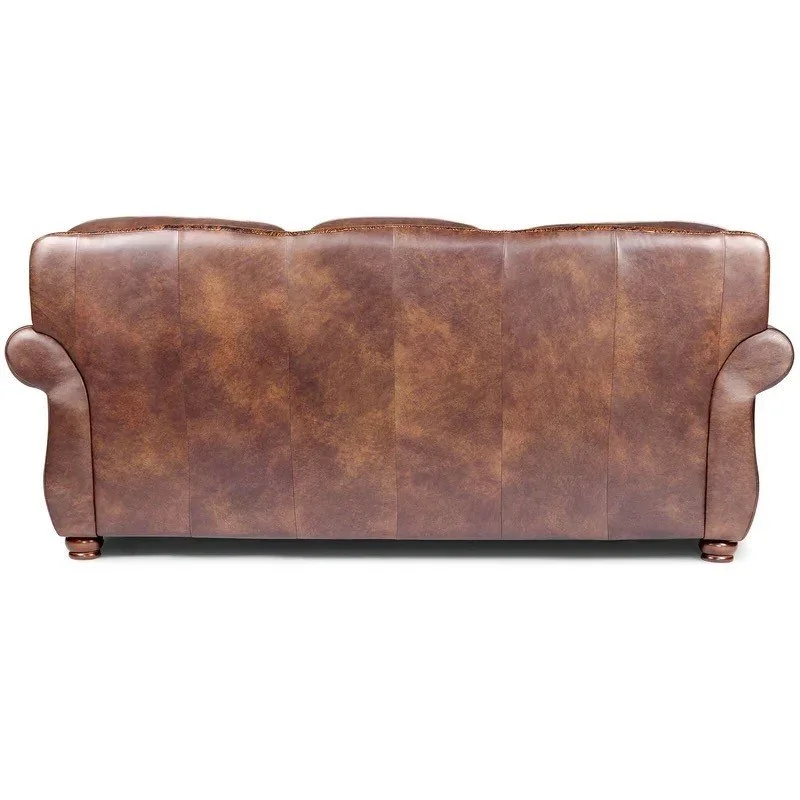 The Sun Valley Western Leather Sofa features rich brown top-grain leather, handcrafted construction, nailhead trim, and timeless Western design for lasting comfort.