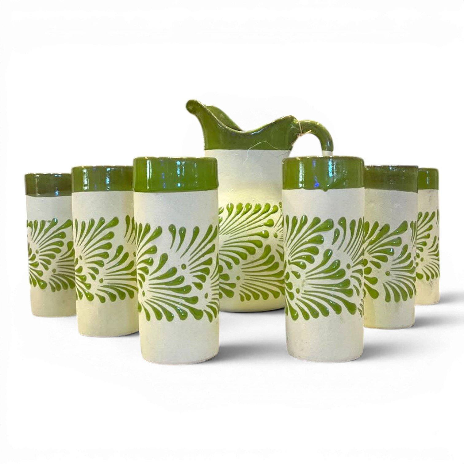 Handmade Mexican barro pitcher and six tumbler set with hand-painted avocado-style Talavera design and glazed rims.