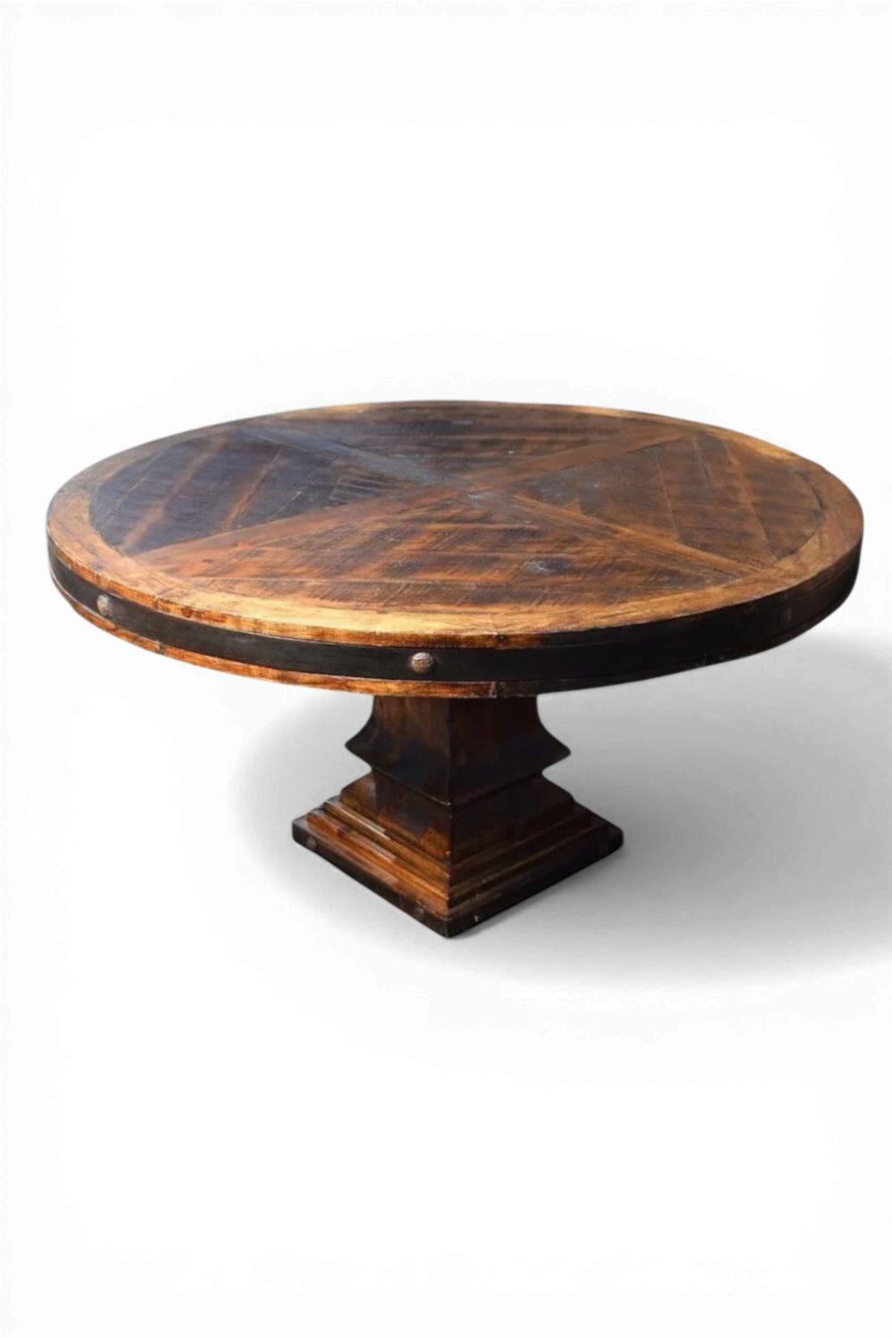 Shop a handmade round dining table from Mexico crafted from reclaimed wood. Rustic hacienda style with iron details, perfect for warm, elegant spaces.