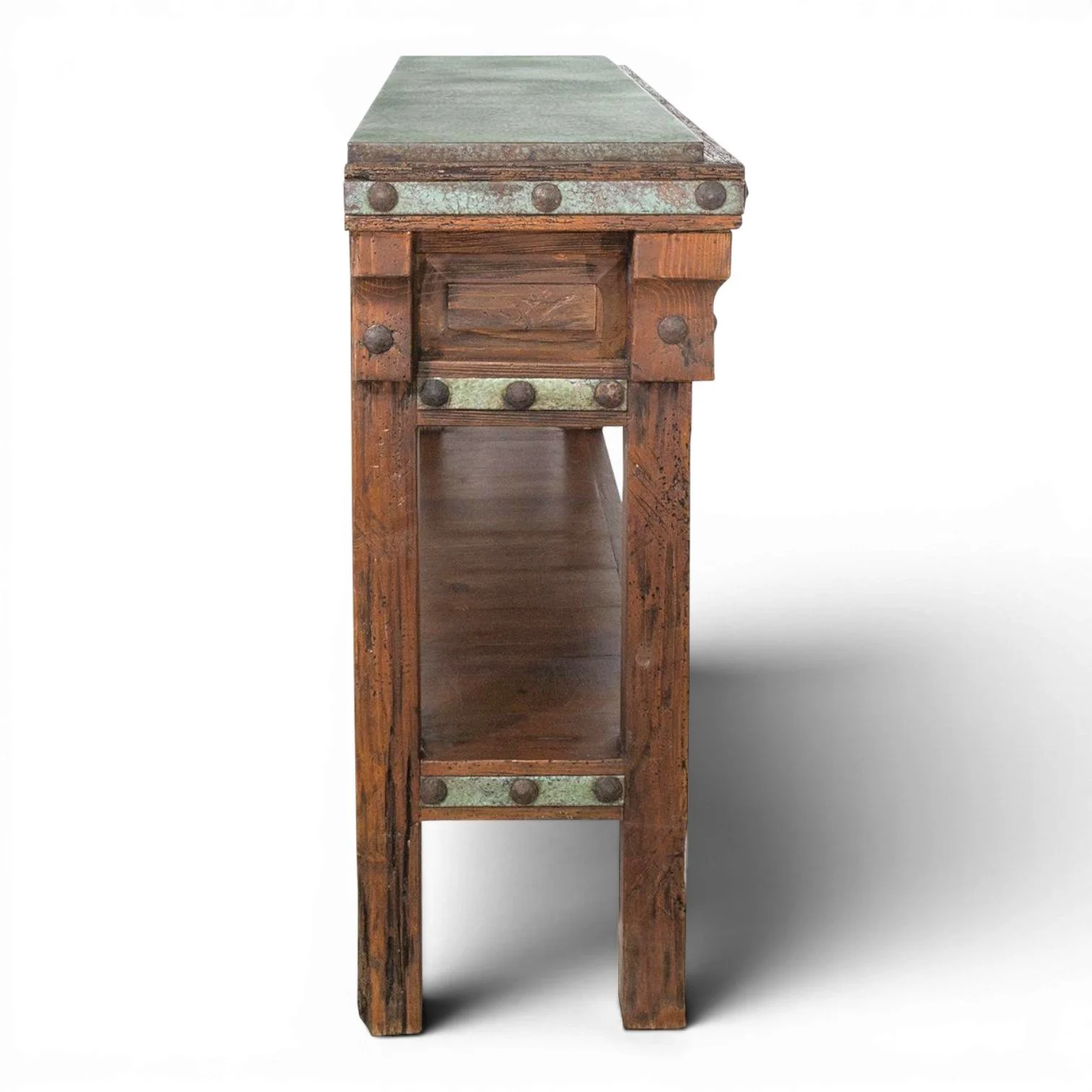 Handmade San Felipe copper sofa table with hand-pounded copper top, carved wood details, decorative clavos, and open shelf.
