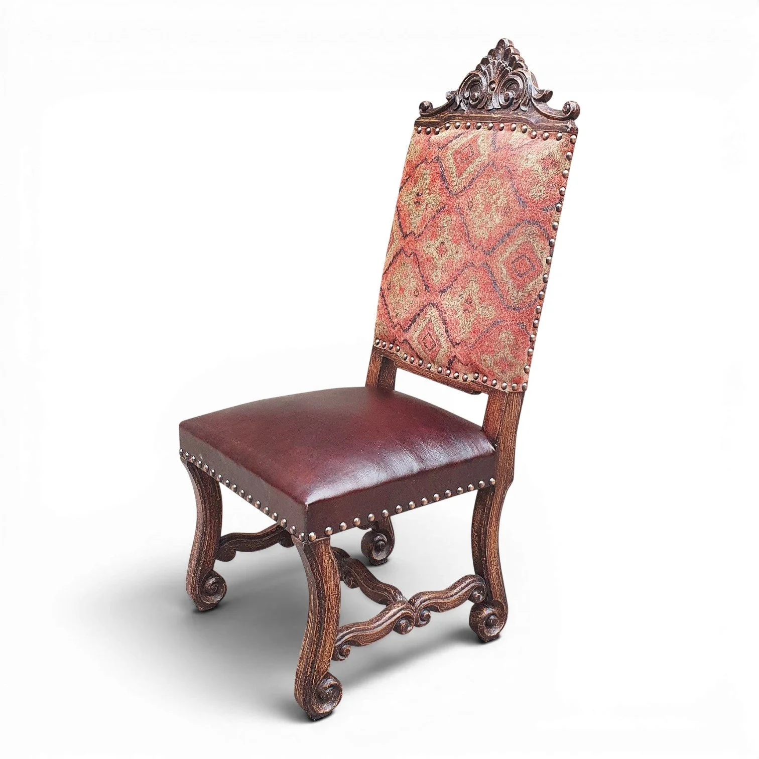 Handmade dining chair with carved wood frame, fabric backrest, and leather seat