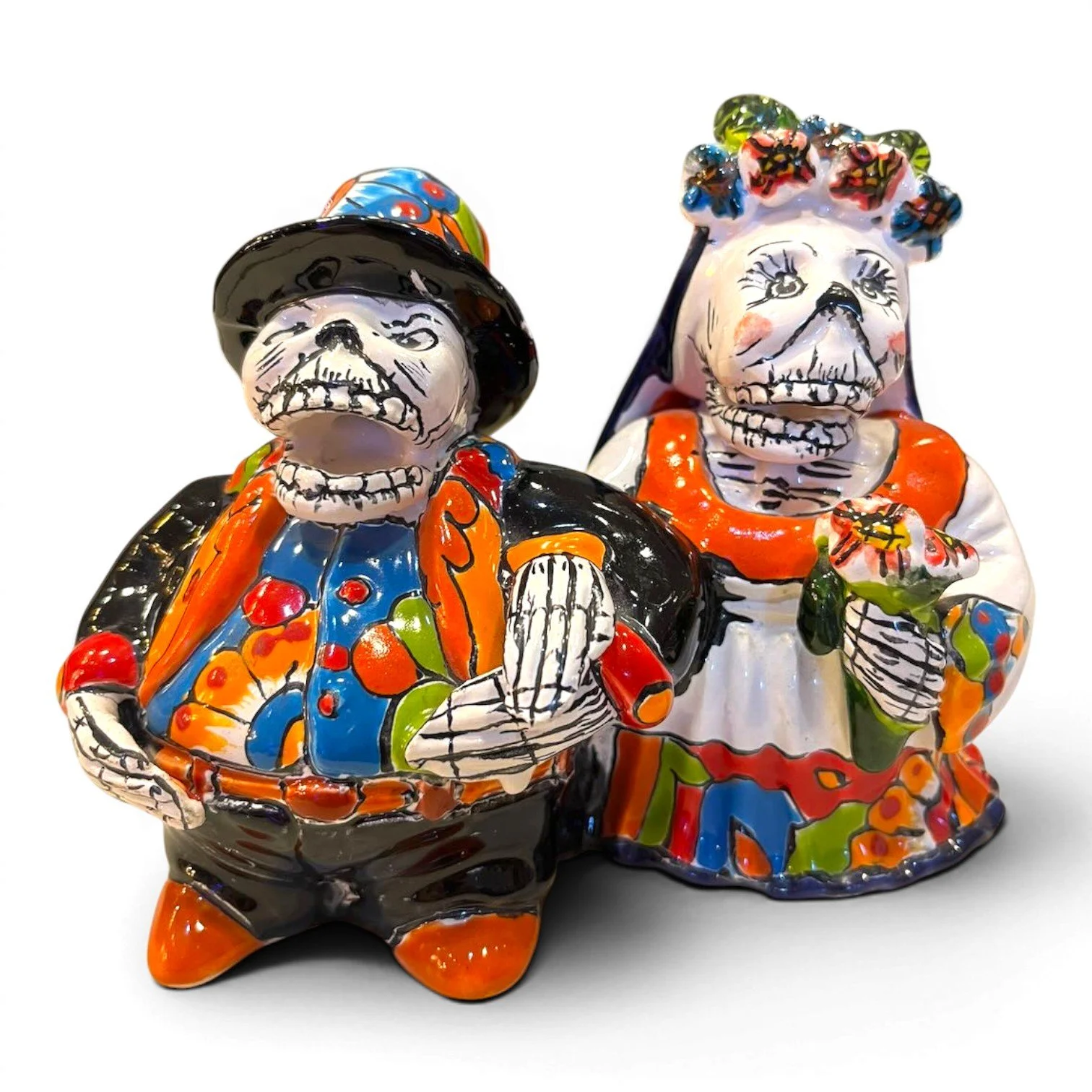 Handmade Talavera figure of an elderly catrín and catrina couple, vibrant hand-painted colors