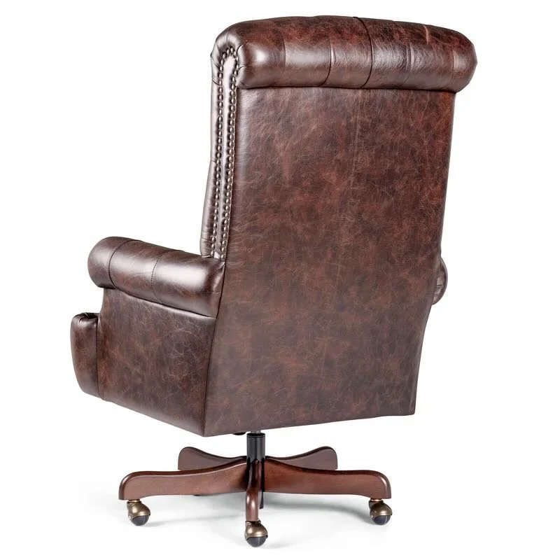 Tufted Dallas executive office chair with top-grain leather upholstery, deep tufted back, nailhead trim, and handcrafted Western styling.