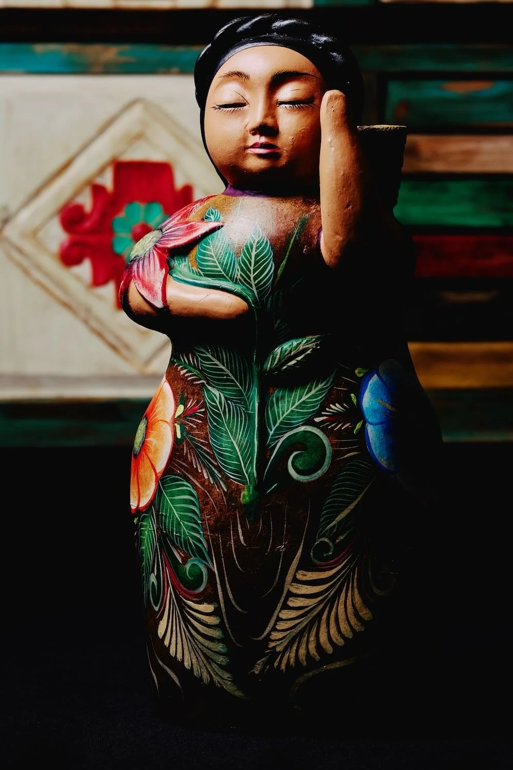 Handmade and painted clay Gordita doll from Mexico.