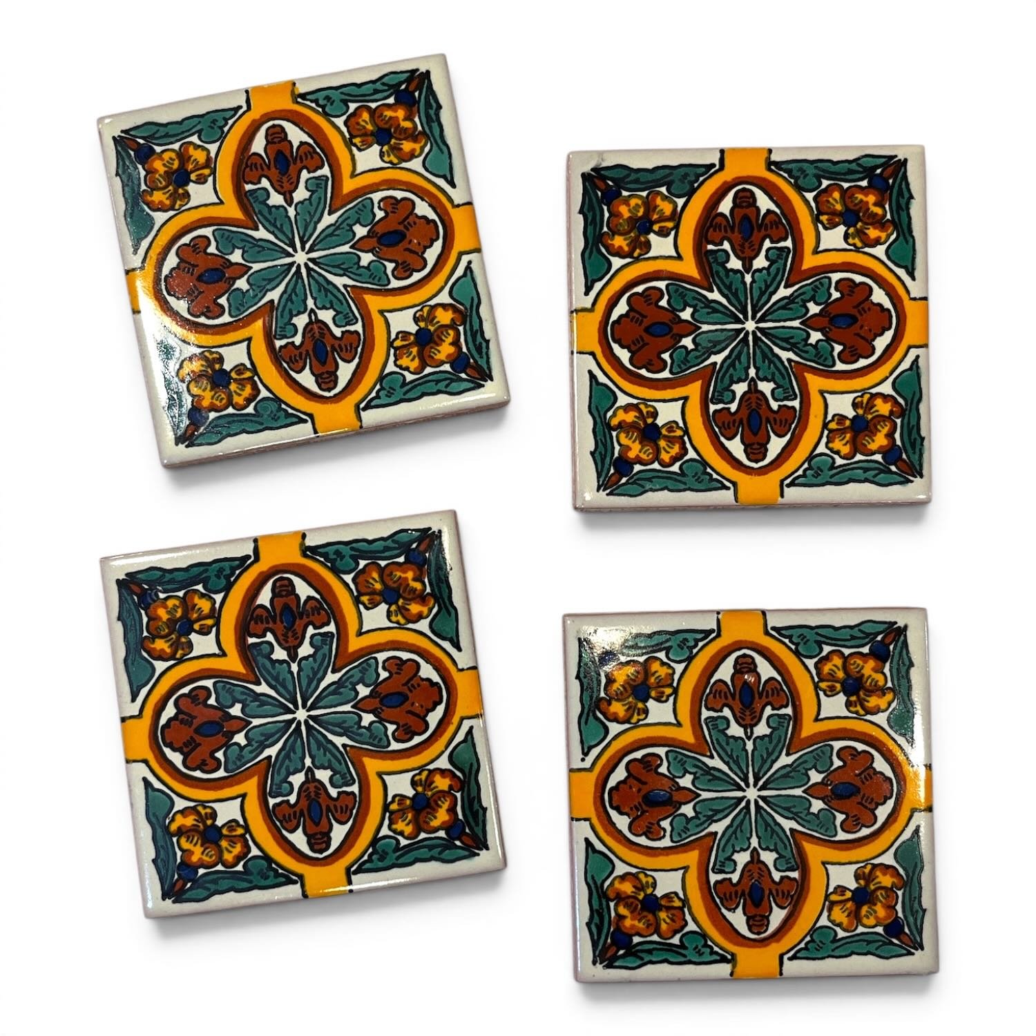 Handmade Talavera tile coaster set from Mexico featuring four colorful ceramic coasters with protective rubber bumpers.