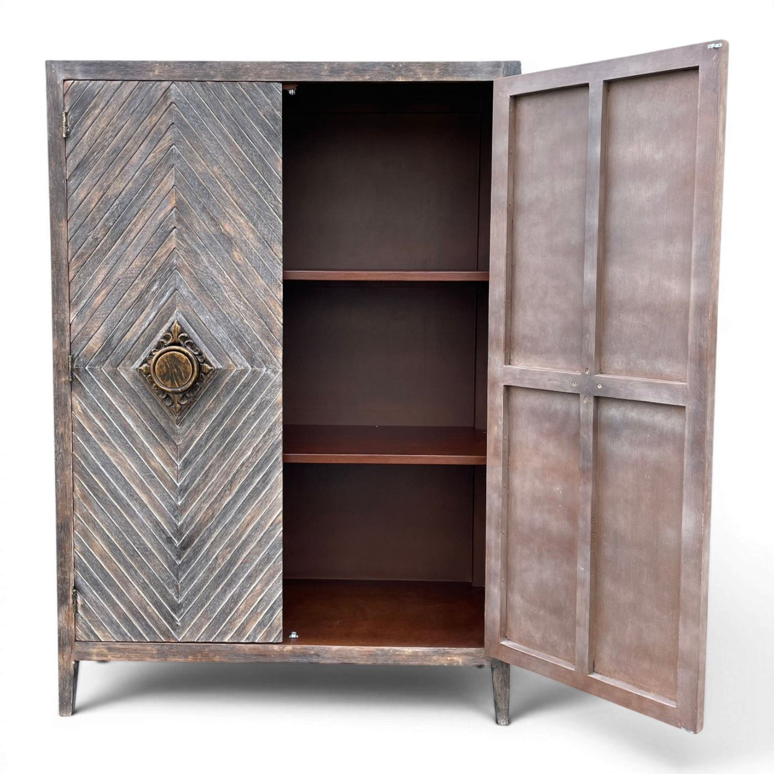 Matucana handmade Peruvian solid wood armoire with chevron-pattern doors, decorative brass handles, and rustic design.