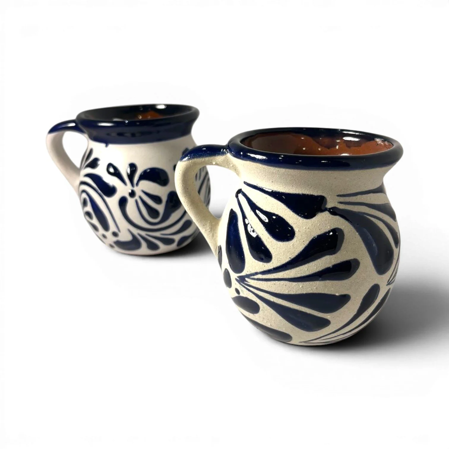 Handmade Mexican cobalt blue clay mug set with glazed rims and artisan interior and exterior design.
