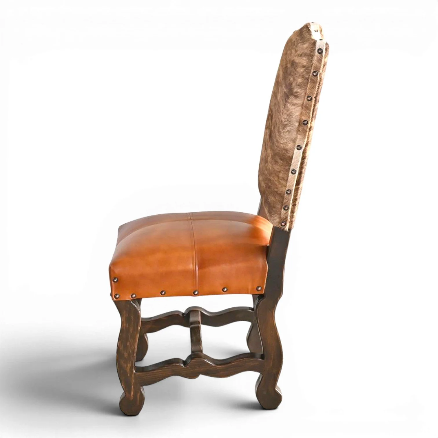 Handmade San Lucas terracotta leather and genuine cowhide dining chair with dark wood frame and decorative nailhead trim crafted in Mexico.