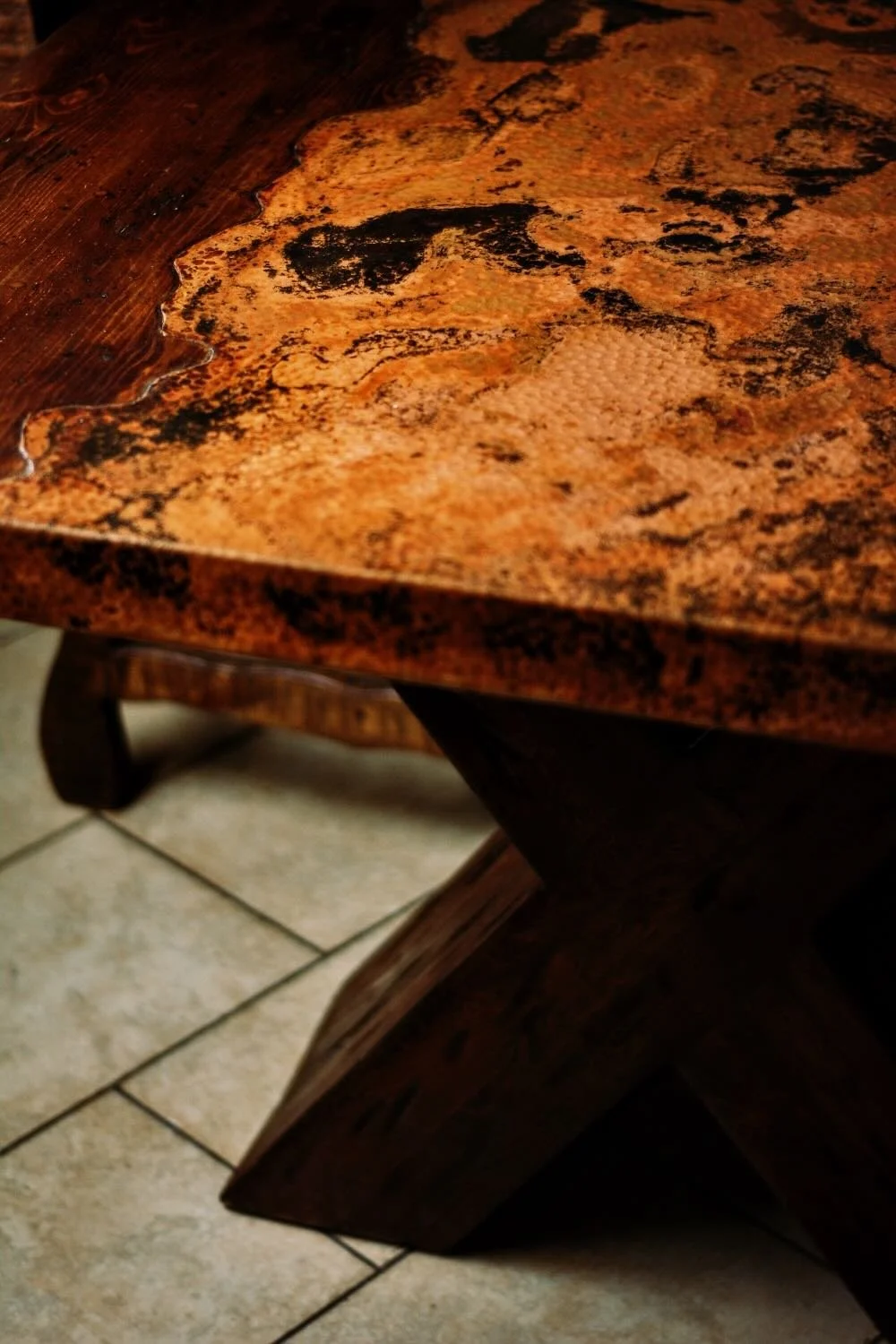 Artesia Leather Dining Table handcrafted in Mexico with reclaimed wood top, crocodile-embossed leather inlay, and X-base design seating up to 10.