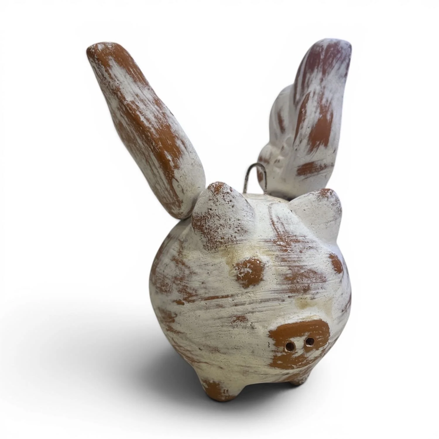Handmade Cerdo Volador flying pig clay sculpture with hand-painted distressed finish crafted in Mexico.
