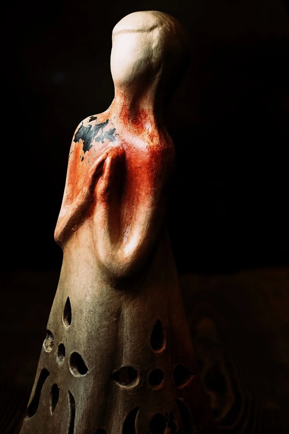 Shop a handmade clay luminaria from Mexico with cutout design. Rustic candle lantern perfect for warm ambient lighting indoors or outdoors.