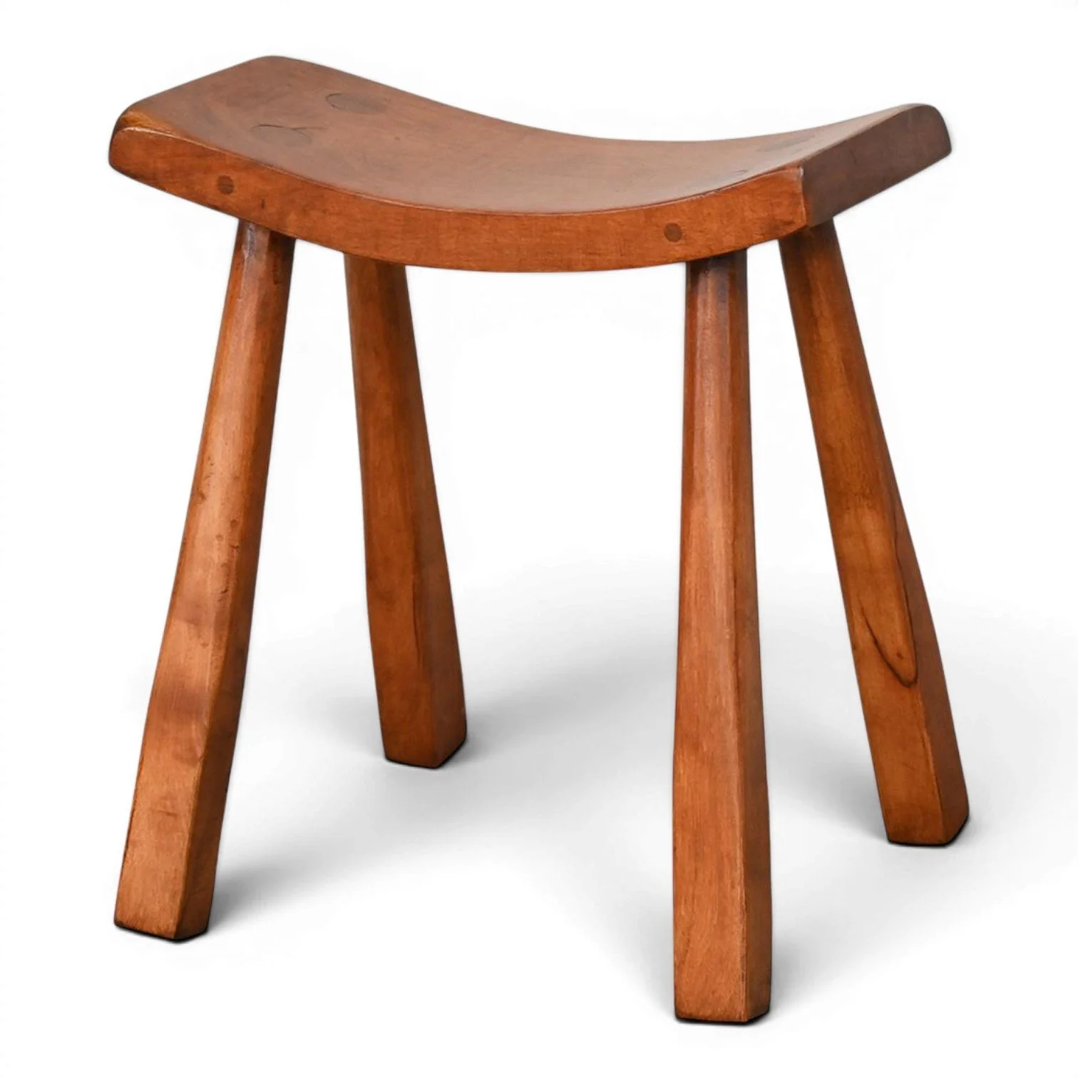 Handmade Bisbee curved solid wood stool with primitive rustic design crafted in Mexico.