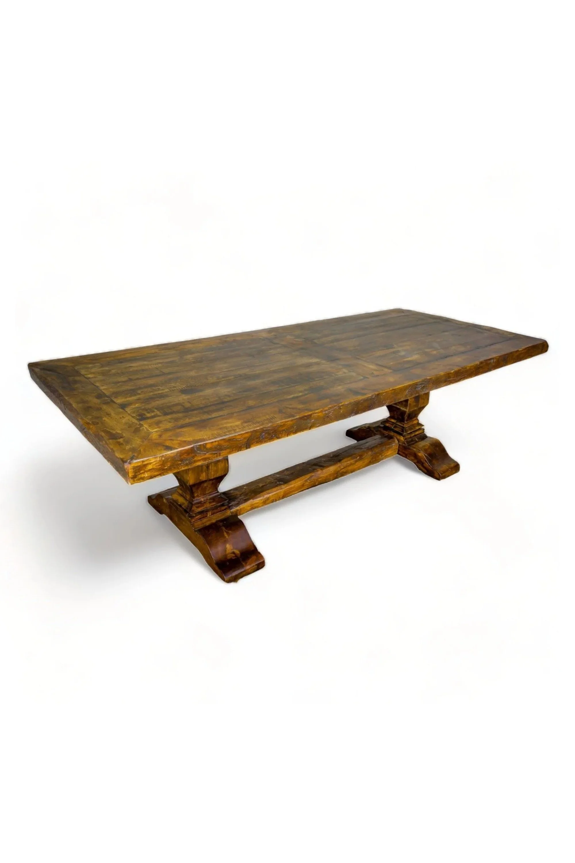 Shop a handmade reclaimed wood dining table from Mexico. Hacienda-style rustic furniture with trestle base, perfect for warm, elegant dining spaces.