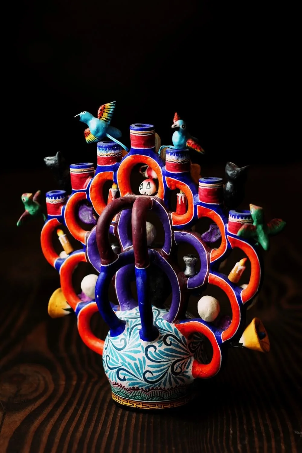 Shop a handmade Day of the Dead Tree of Life from Mexico. Colorful clay folk art with skulls, flowers, and candle holders for unique decor.