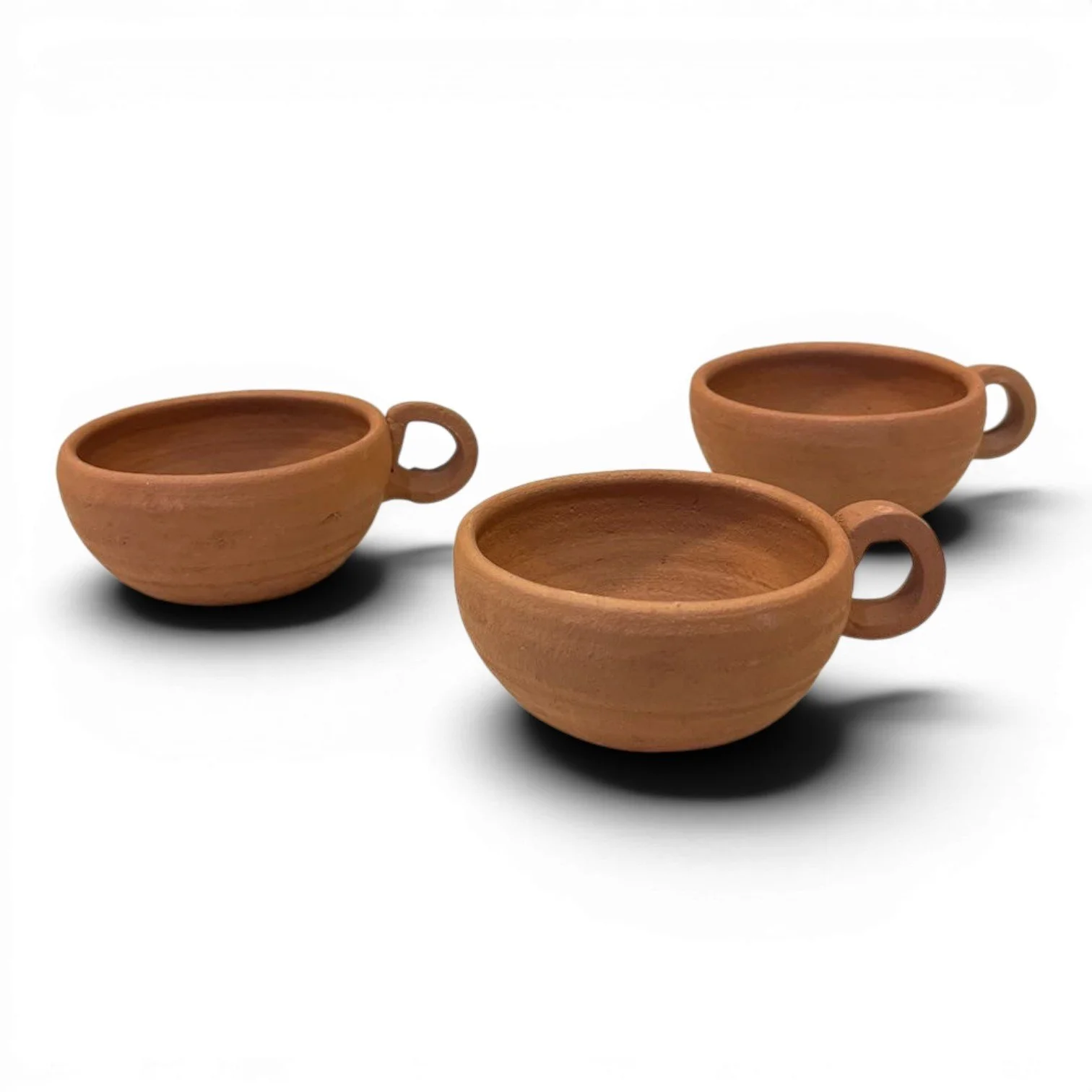 Handmade Medium Oaxaca red clay coffee cup from Mexico with traditional artisan craftsmanship and rustic finish.