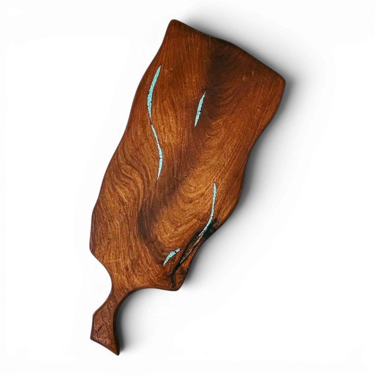 Handmade Mexican mesquite wood cutting board with turquoise inlay and natural wood grain.