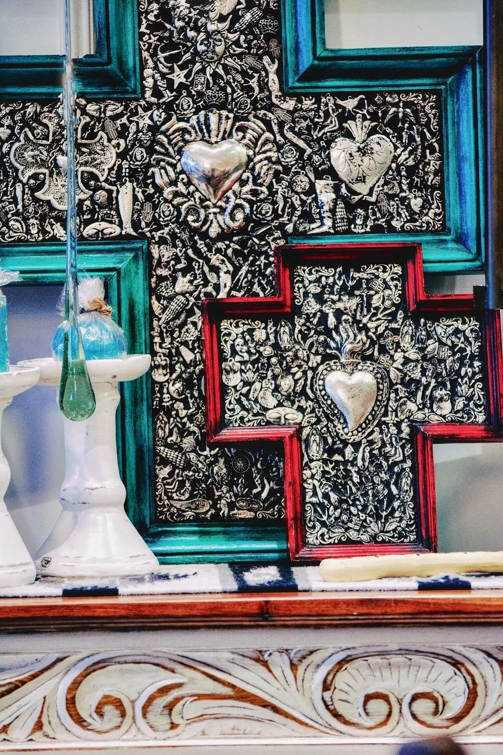 Large Turquoise and Red Milagros Crosses from Mexico.