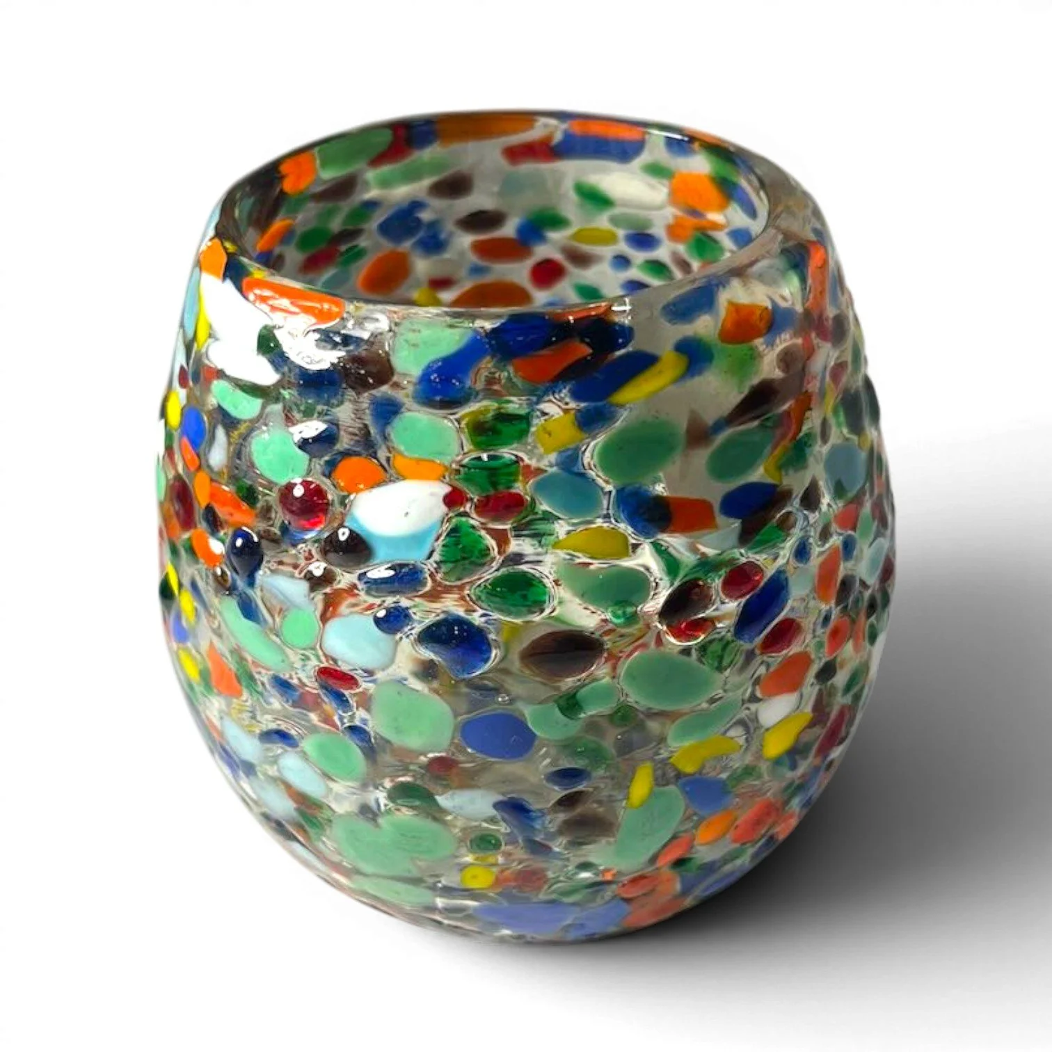 Handblown Mexican Guanajuato confetti glass with rounded base and colorful artisan finish.