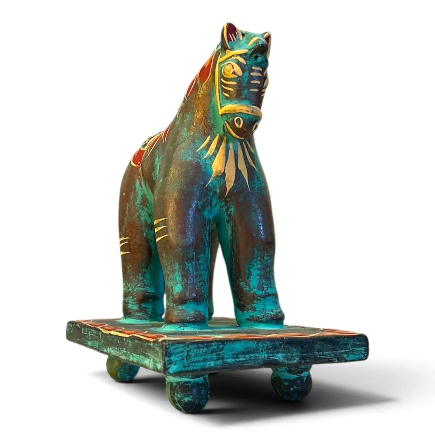 Handmade clay Trojan horse figure with unique hand-painted design on a pedestal