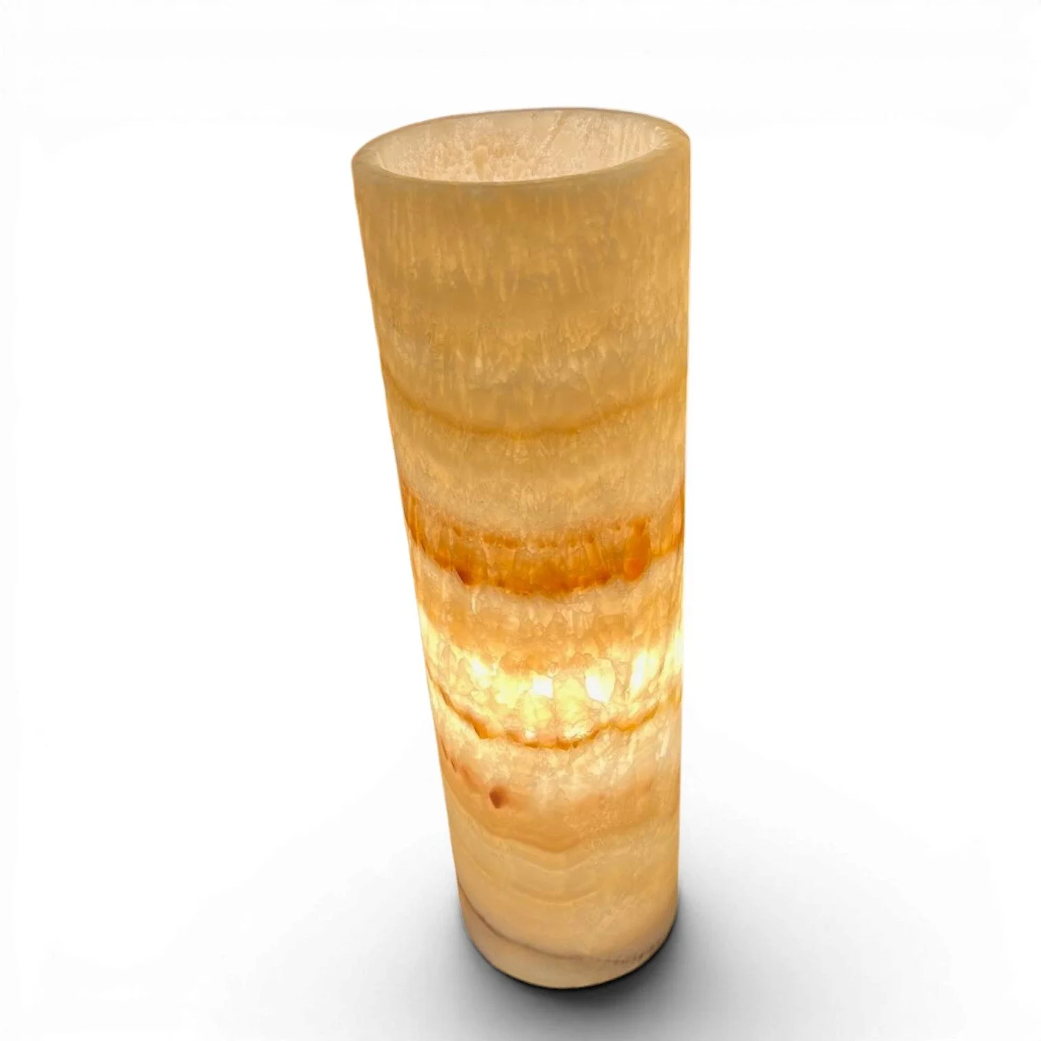 Handmade Mexican cylinder onyx lamp with warm glowing natural stone and coastal luxury design