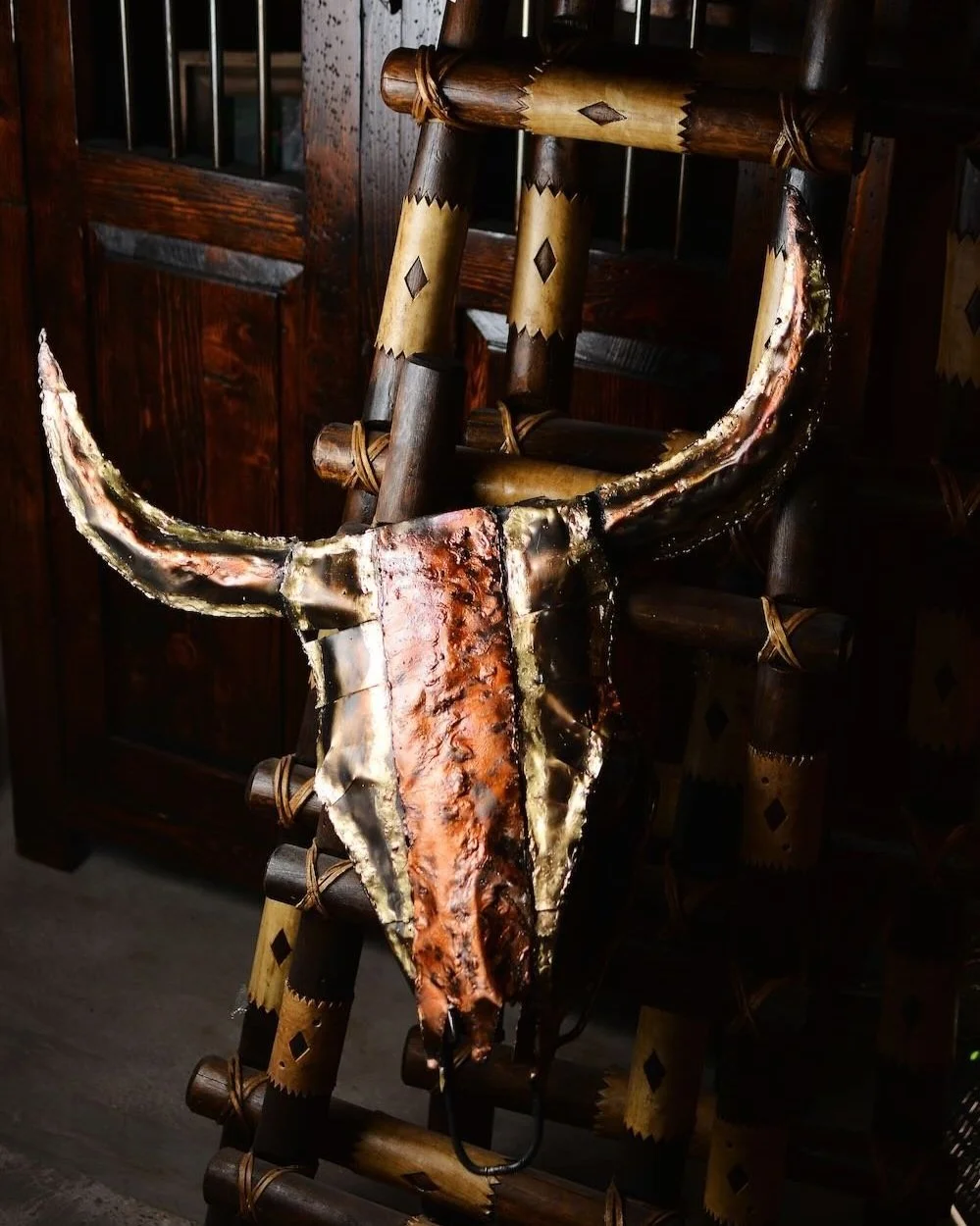 Handmade Copper Steer Head Skull wall art crafted in Mexico with rustic copper detailing.