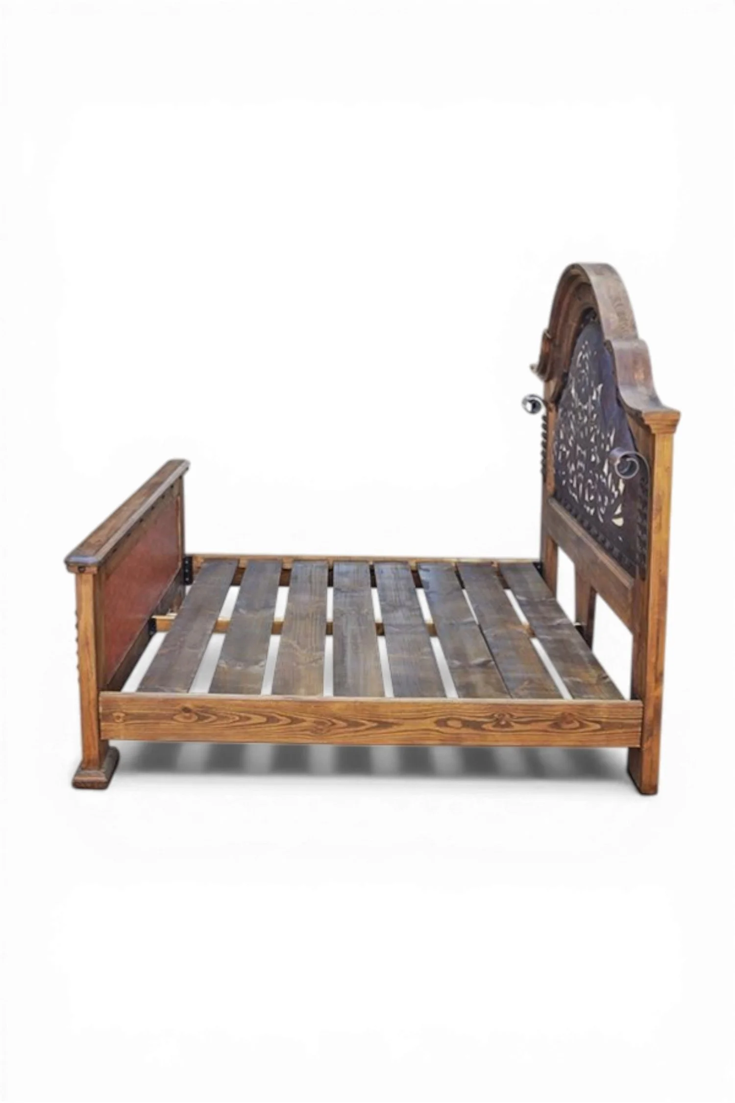 Shop a handmade tooled leather bed from Mexico. Rustic hacienda-style bed with carved wood, iron accents, and artisan craftsmanship.