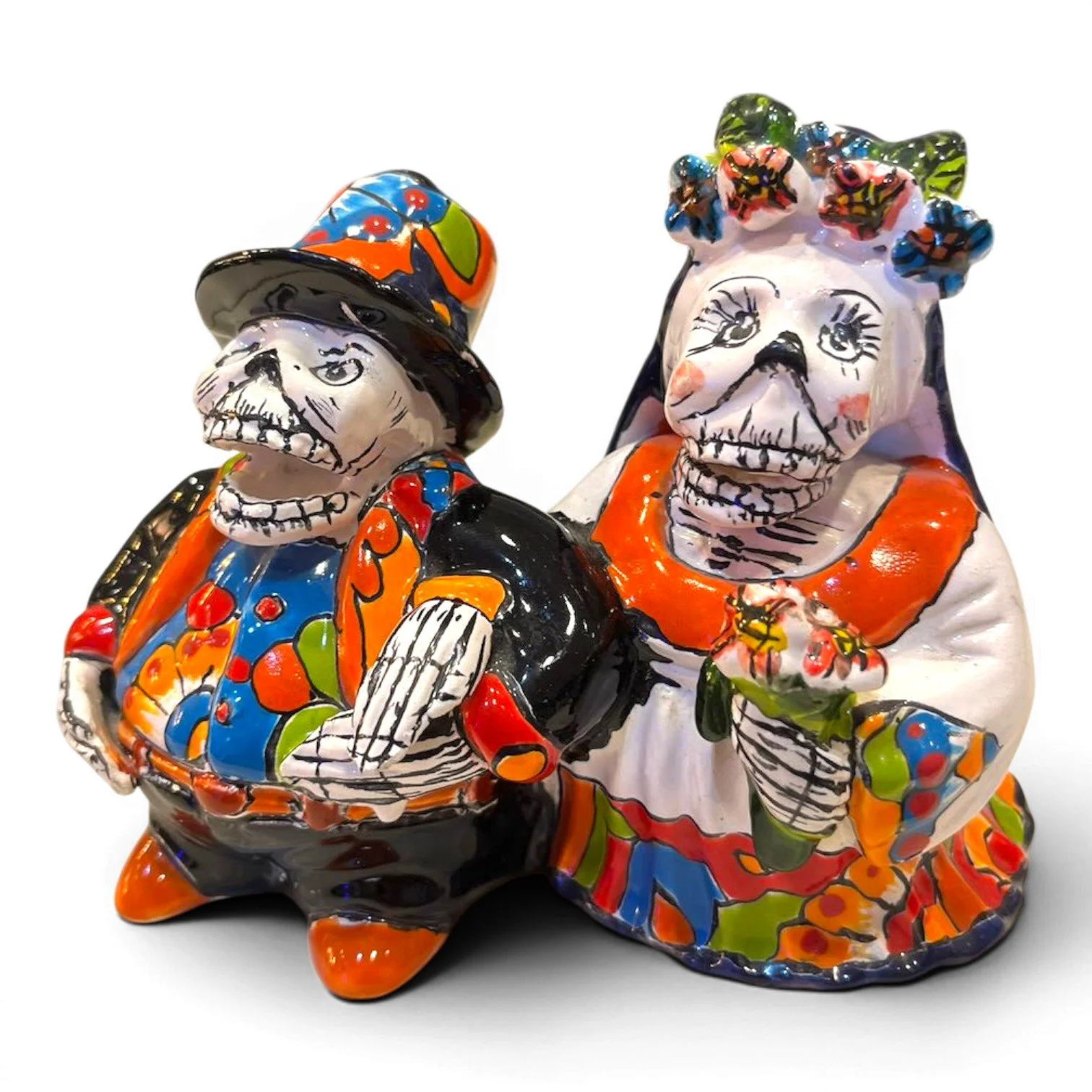 Handmade Talavera figure of an elderly catrín and catrina couple, vibrant hand-painted colors