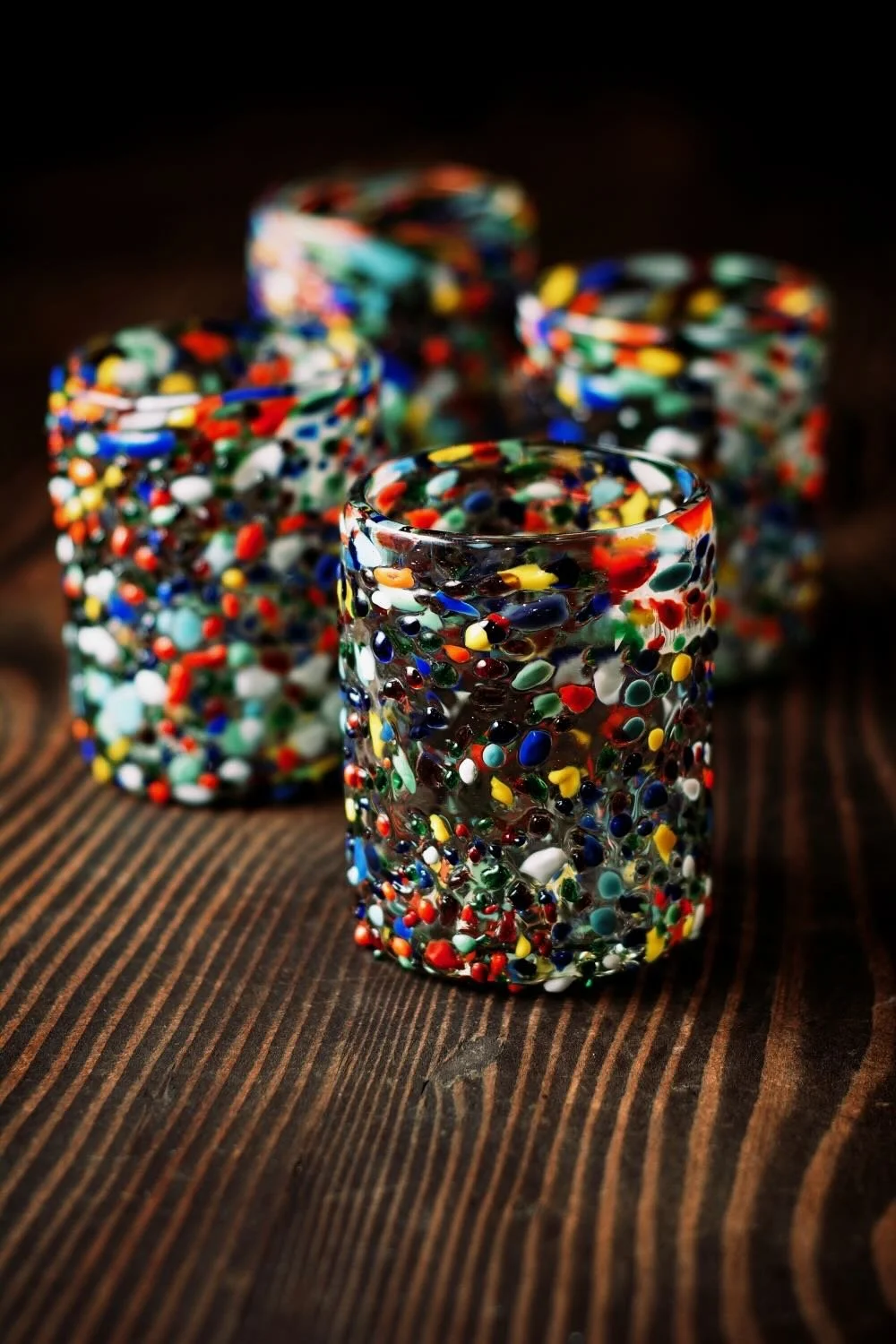 Shop a handblown Guanajuato tumbler from Mexico. Colorful confetti glassware perfect for everyday drinks, entertaining, and unique table settings.