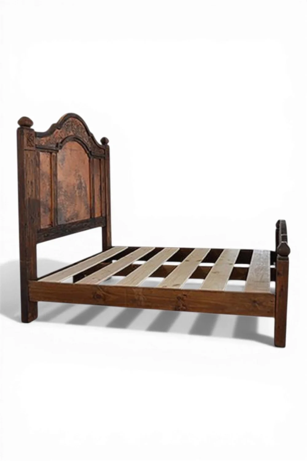 Shop a handmade copper bed from Mexico. Rustic wood frame with embossed copper panels and artisan craftsmanship for elegant bedrooms.