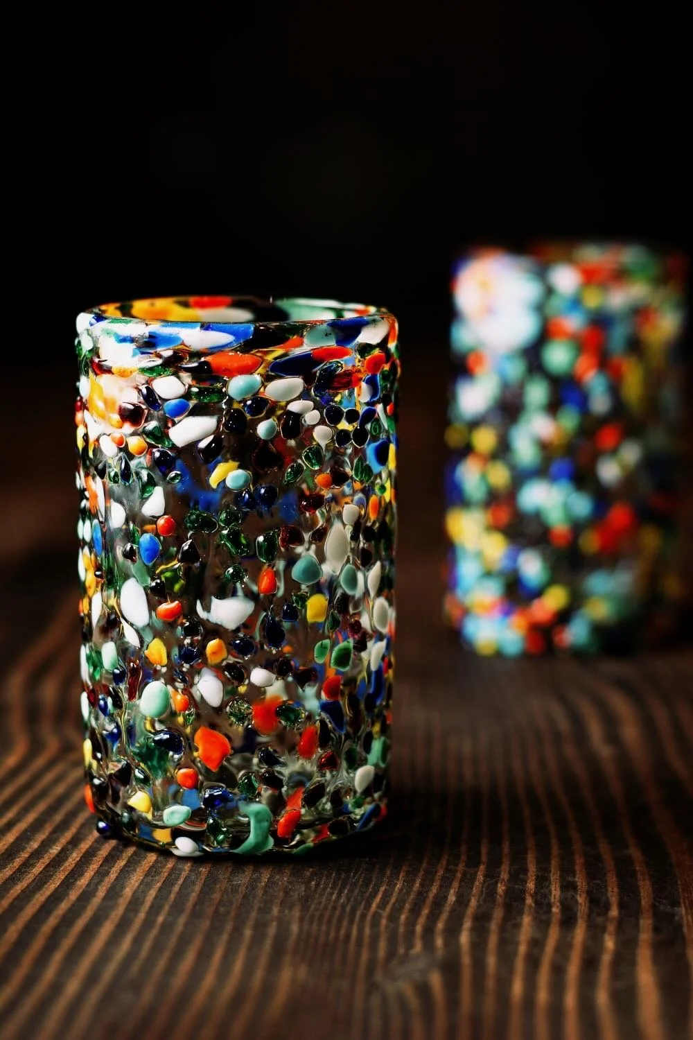Shop a handblown Guanajuato tall tumbler from Mexico. Colorful confetti glassware perfect for everyday drinks, entertaining, and unique table settings.