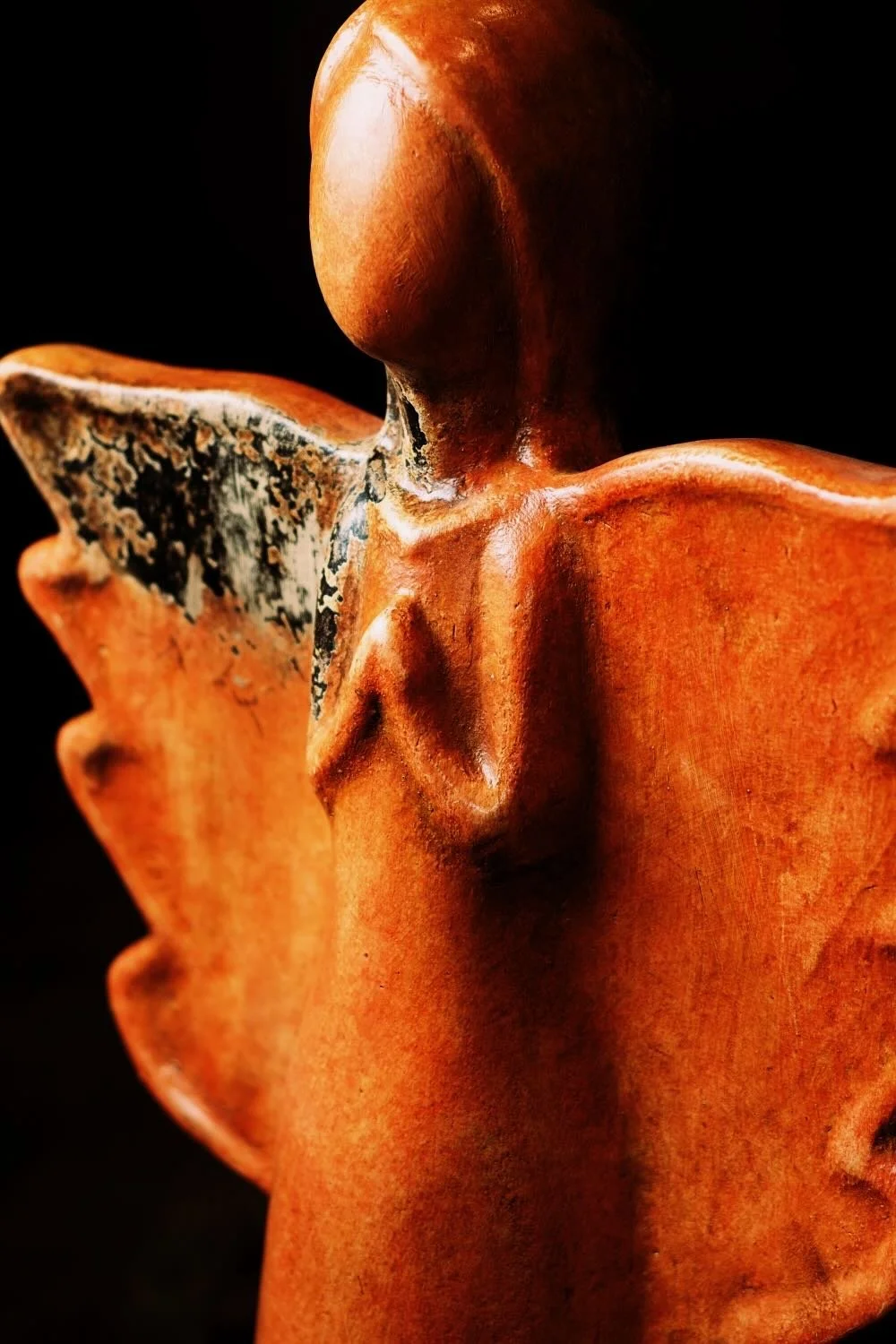 Shop a handmade praying angel sculpture from Mexico. Rustic clay decor with distressed finish and large wings for spiritual home accents.