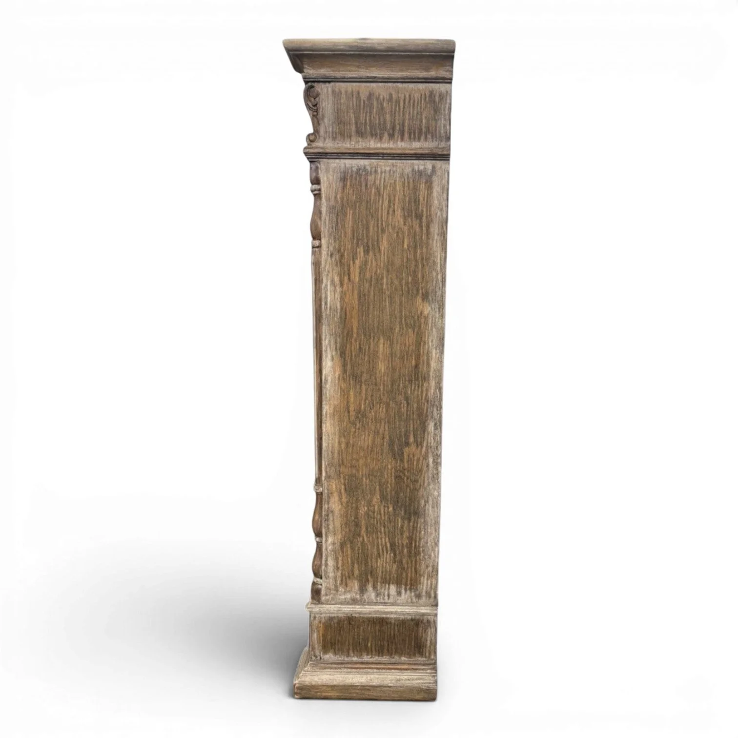 Yucca carved Peruvian bookcase with distressed wood finish, floral scrollwork top frieze, open shelving, and lower storage drawers.