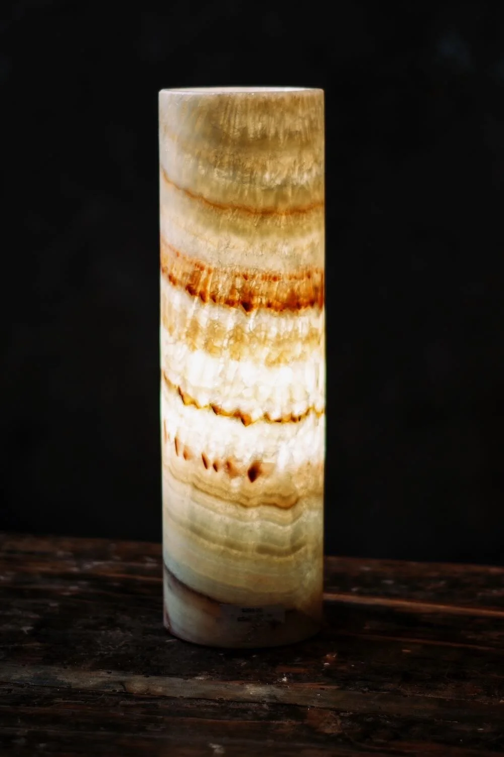 Sonoran Onyx Cylinder Lamp - 16". Hand-carved 16" cylinder lamp made from rare mined onyx. Features unique tan, brown, and gold veining.