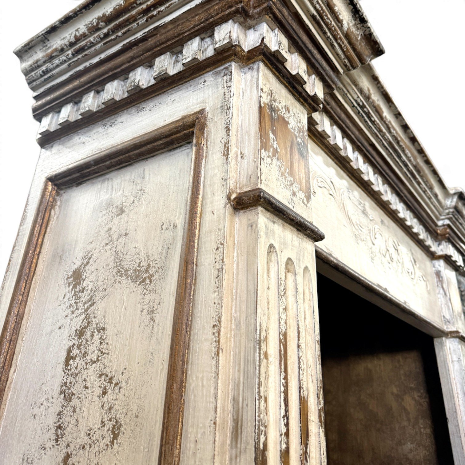 Madrid Antique White handcrafted Peruvian bookcase with distressed finish, carved details, fluted columns, open shelving, and lower storage drawer.