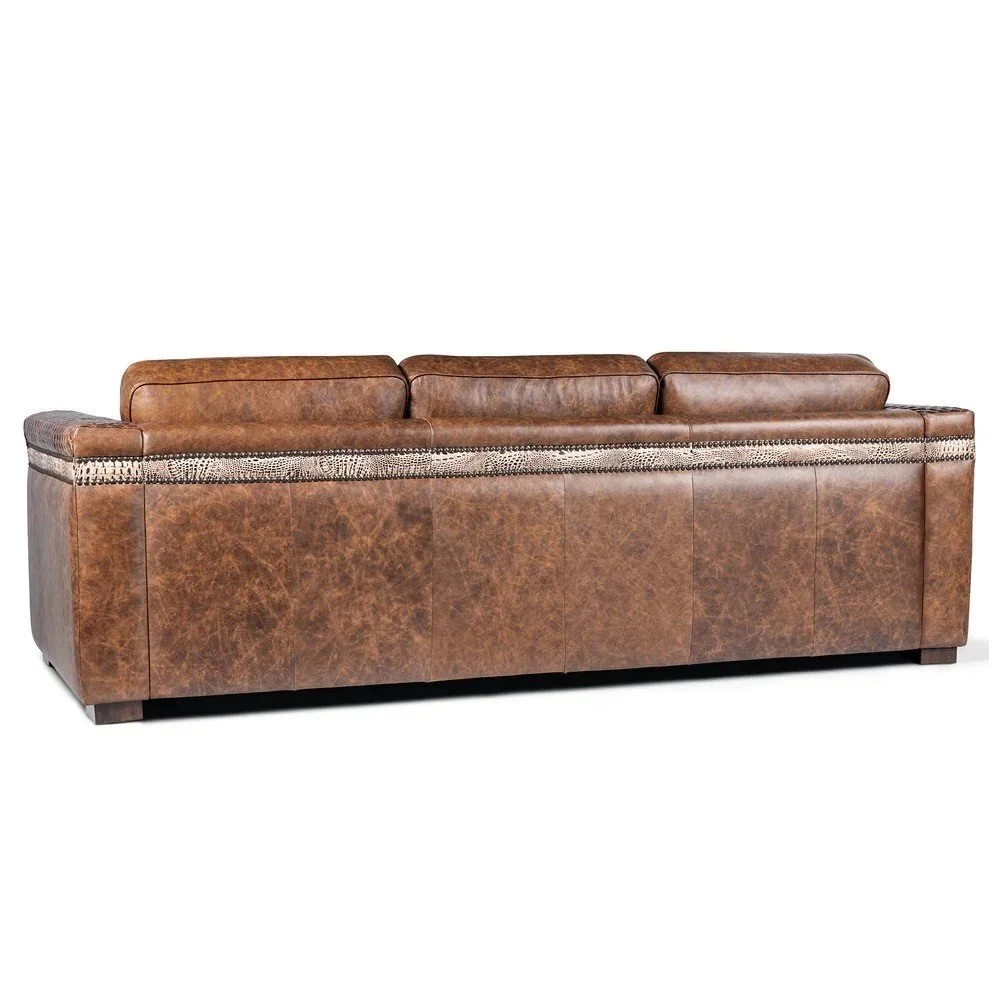 The Carson City Quilted Sofa with Croc Angle Leather features premium top-grain leather, croc-textured accents, quilted detailing, and handcrafted Western design for bold luxury and comfort.