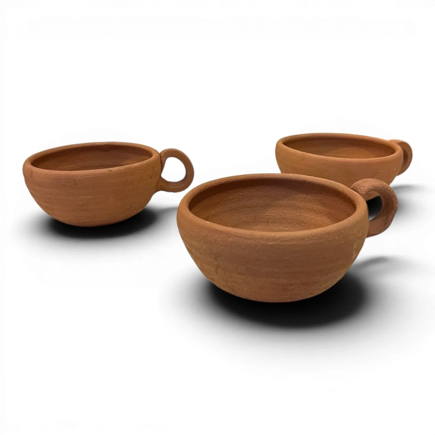 Handmade Large Oaxaca red clay coffee cup from Mexico featuring rustic artisan craftsmanship and natural finish.