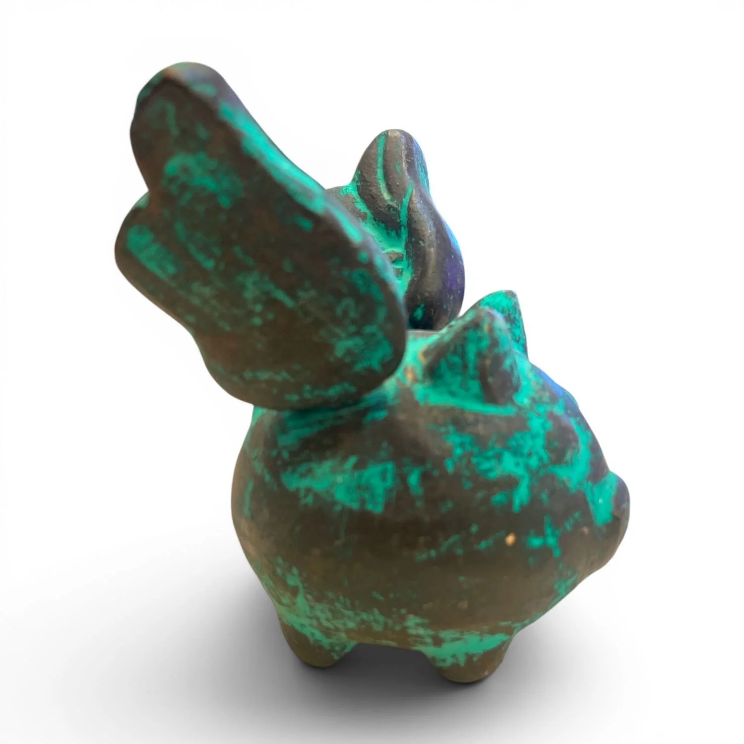 Handmade Cerdo Volador flying pig clay sculpture with hand-painted distressed finish crafted in Mexico.