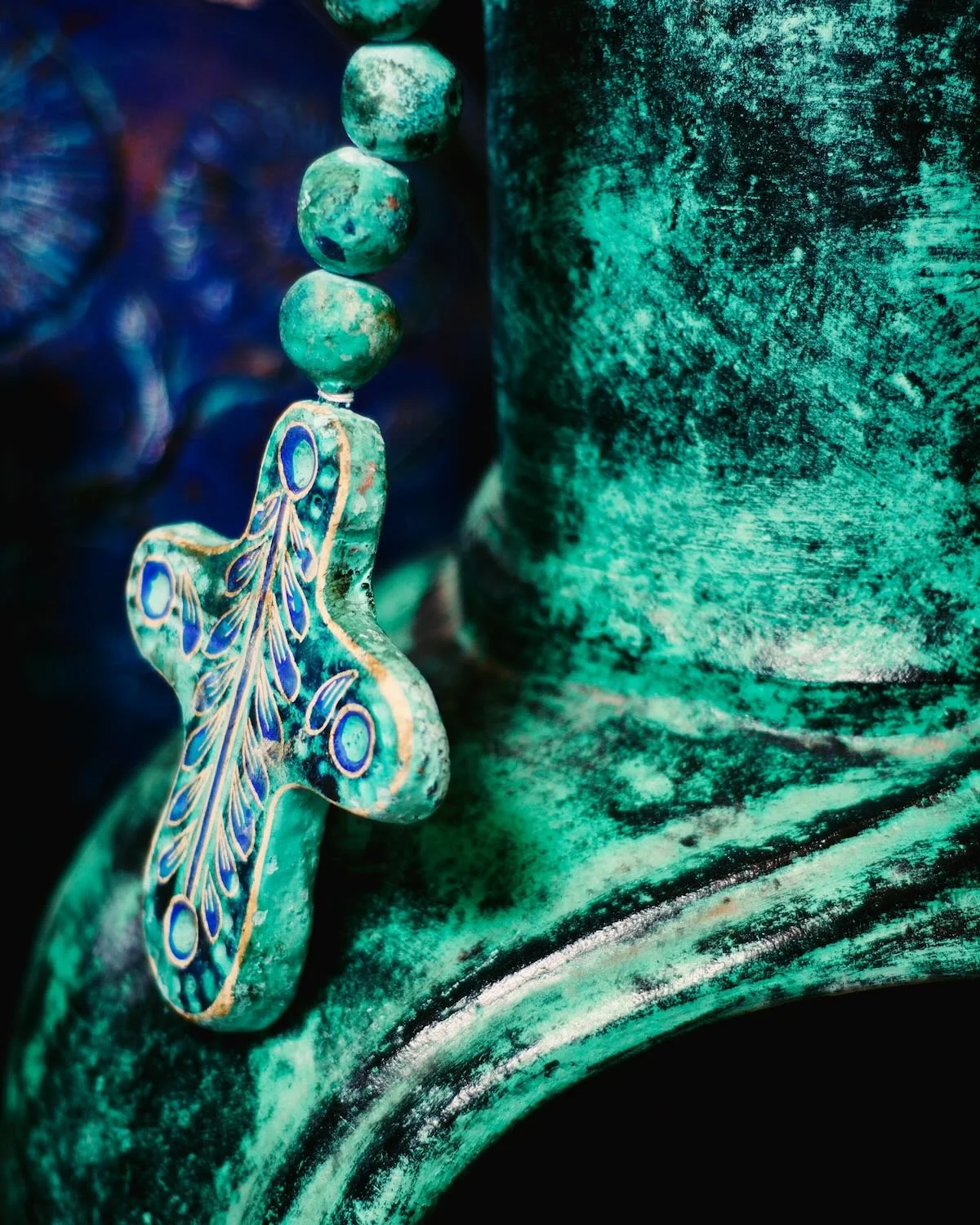 Turquoise terracotta chimineas and rosary beads from Mexico.