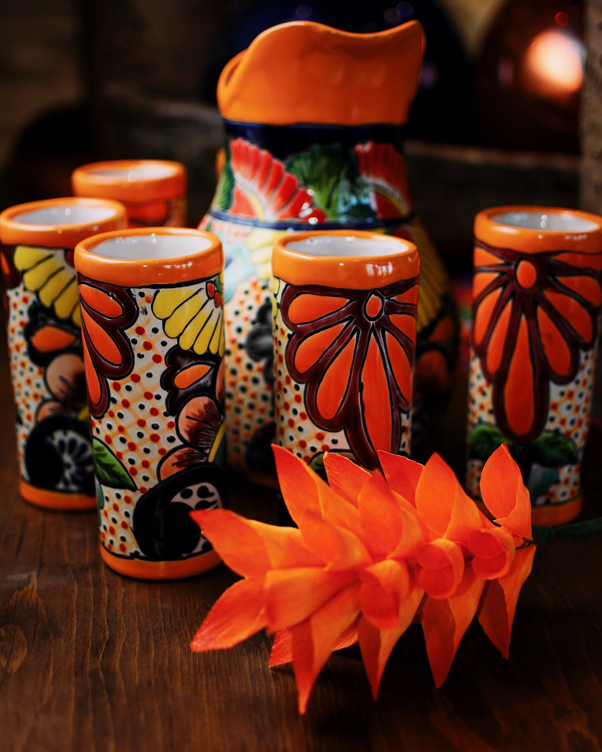 Vibrant Talavera pitcher and tumbler set from Mexico.