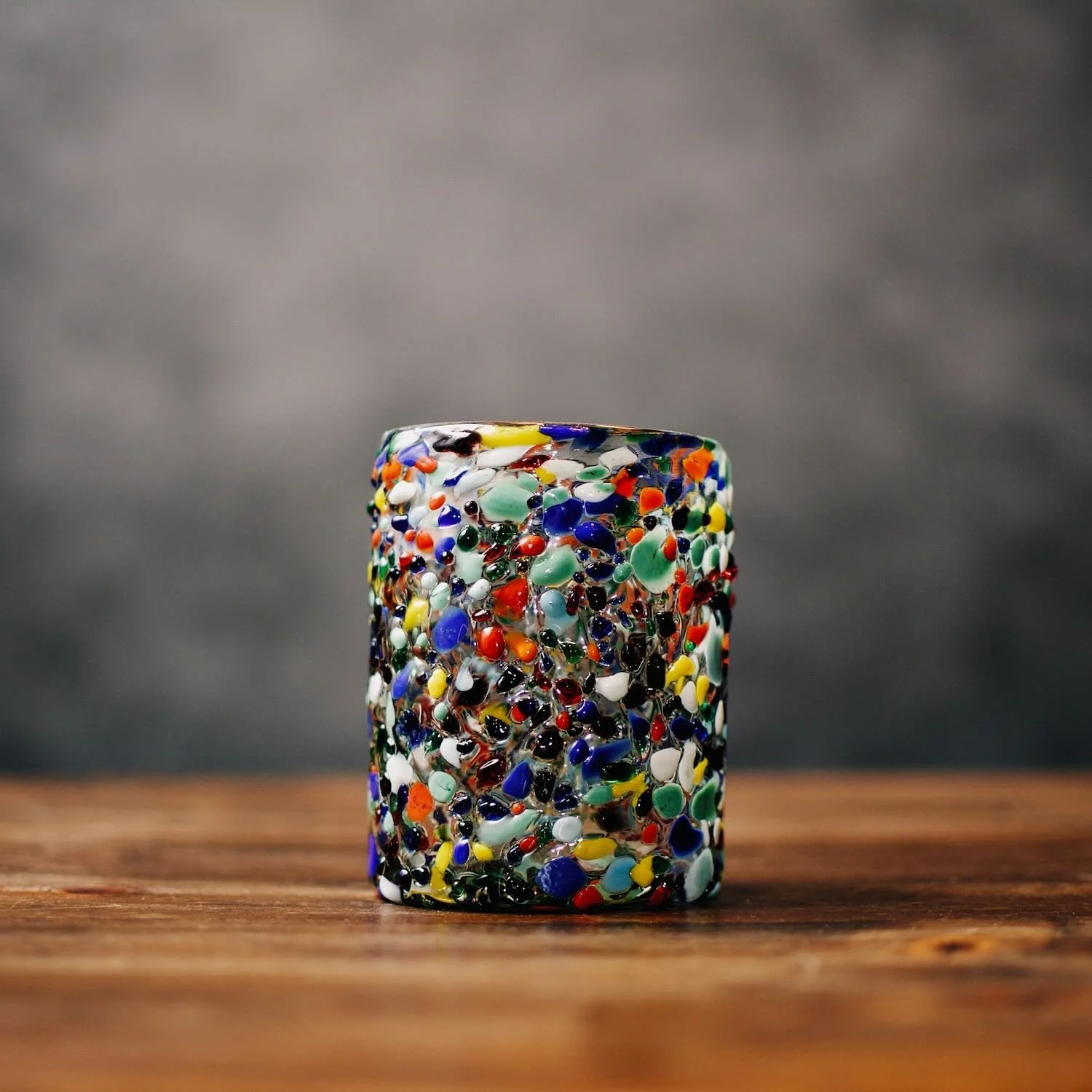 Handblown Mexican Guanajuato confetti glass tumbler with colorful textured artisan finish.