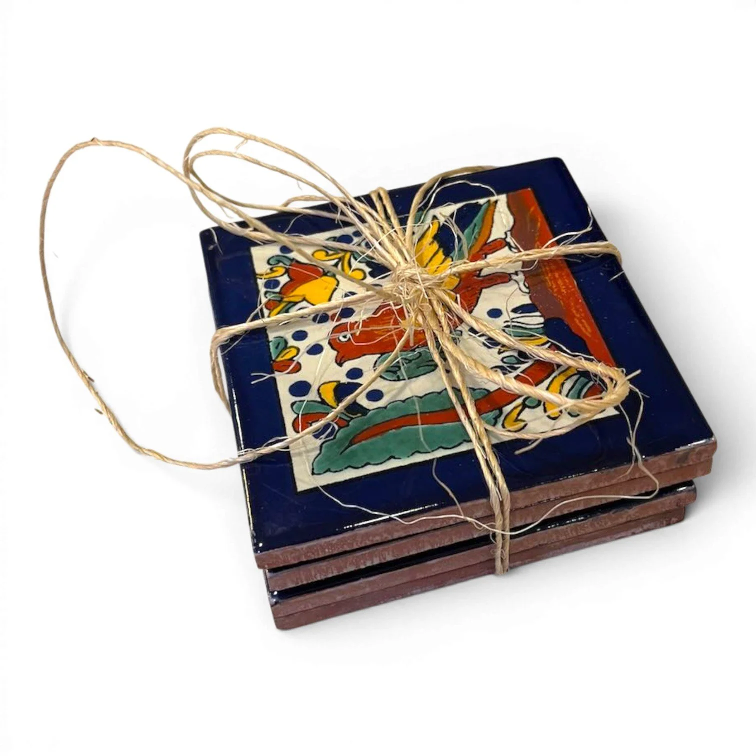 Set of four colorful Talavera tile coasters with hand-painted Mexican pottery designs